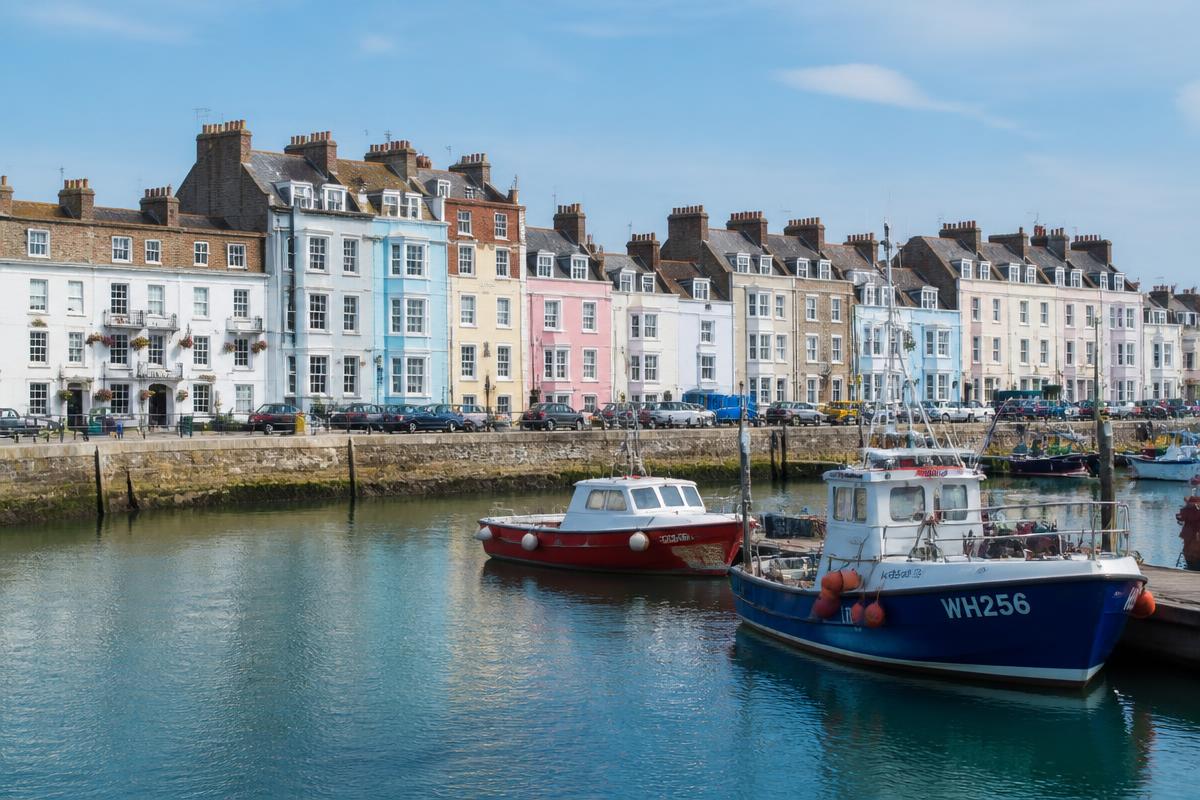 Weymouth harbour with pastel seafront houses